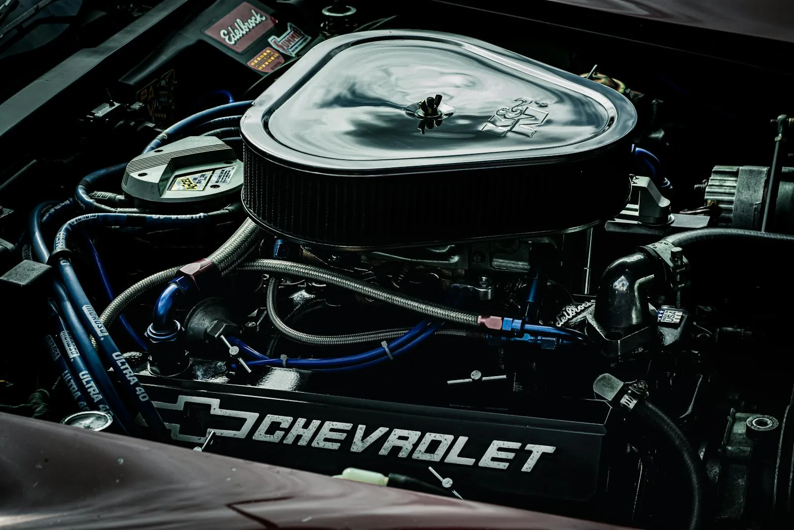 Petrol engine seen under an open bonnet